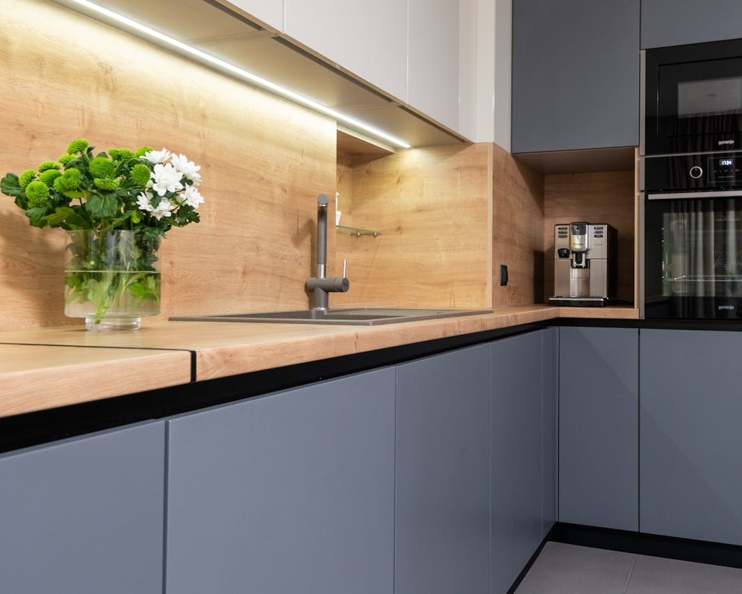 kitchen interior with built in electric appliances at home